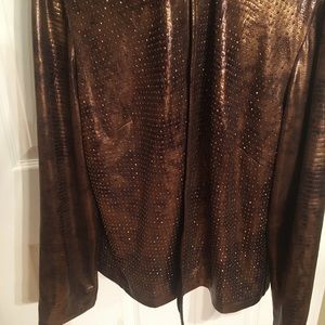 Chico’s size 1   100% acrylic backing fab. 95% poly